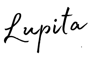 the name "Lupita" in handwriting font